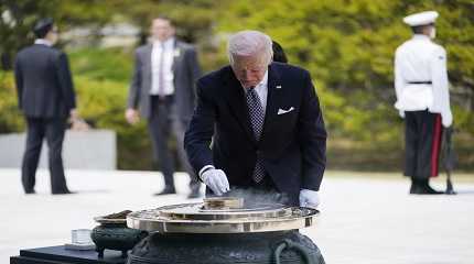 Joe Biden participates in a wreath laying ceremony