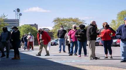 People outside a newly reopened career center