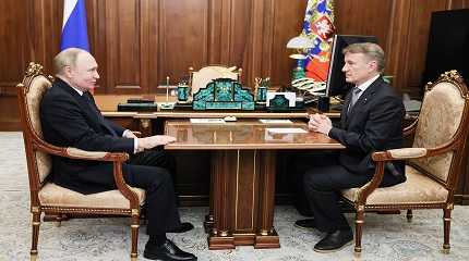 Vladimir Putin and Sberbank CEO Herman Gref