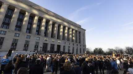 crowd gathers outside the courthouse