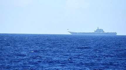 helicopter takes off from China's Shandong aircraft carrier