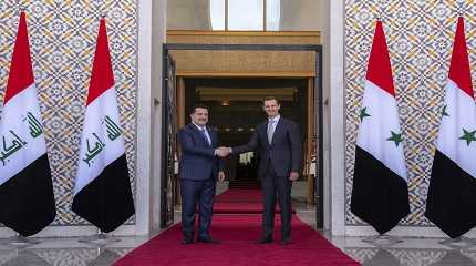 Syrian Assad with Iraqi Mohammed Shia al-Sudani
