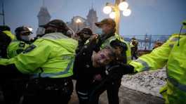 Canadian police clash protesters