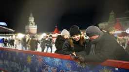 Visitors enjoy the ice rink in Red Square Moscow