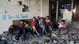  Gaza children in rubble after Israel bombing