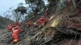 rescuers searching for the black boxes at a plane crash site