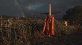World Press Photo Of The Year shows Red dresses hung on crosses