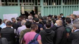 People line up to vote during parliamentary elections in Lebanon