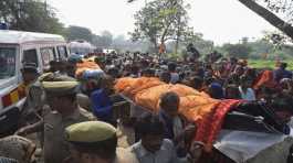 bodies of victims of a road accident in India