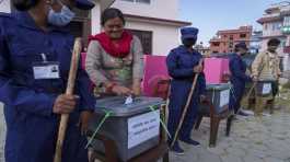 Nepalese people participate in a mock election