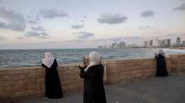 Palestinian citizens of Israel overlook the Mediterranean sea