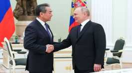 Vladimir Putin and Wang Yi