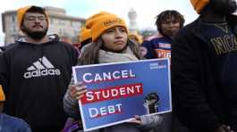 Student debt relief advocates outside the Supreme Court