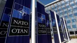 Banners displaying the NATO logo
