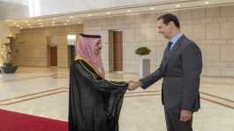 Bashar Assad and  Faisal bin Farhan
