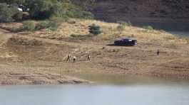 Police search team at Arade dam near Silves, Portugal