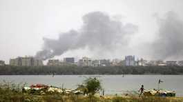 smoke rising in Khartoum, Sudan