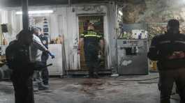 Israeli police examine the crime scene