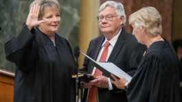 Janet Protasiewicz, left, is sworn as a Wisconsin Supreme Court justice