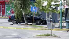 car is seen on site of shooting in bosnian town