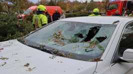 windshield is seen destroyed of strom damage