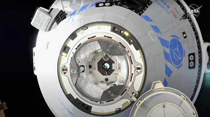 Boeing Starliner preparing to dock at the International Space Station