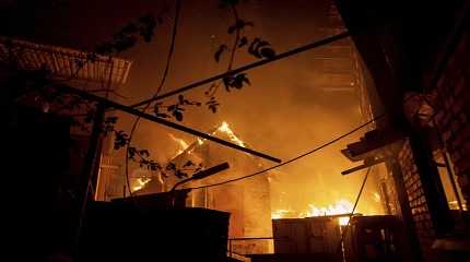  house burns after a Russian attack