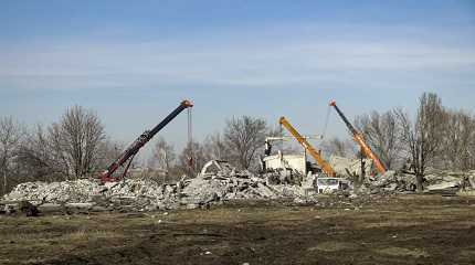 Workers clean rubbles