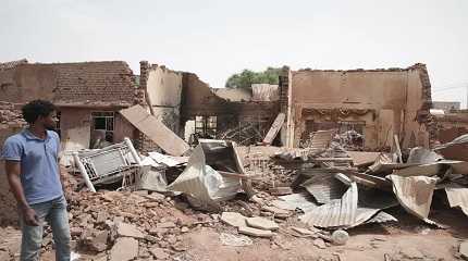 house hit in recent fighting in Khartoum