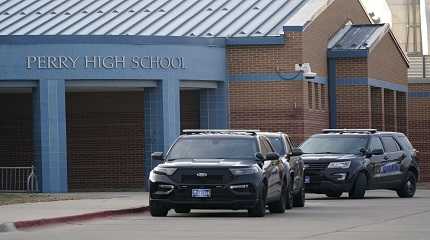 police vehicle in front of perry high school