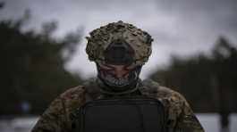 Ukrainian serviceman controls a drone