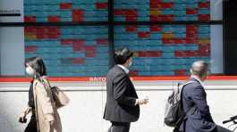 electronic stock board showing Japan's Nikkei 225 index