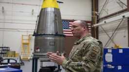 Andrew Zahm in front of Minuteman III intercontinental ballistic missle