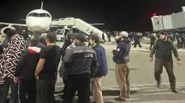 Hundreds storm airport in Russia